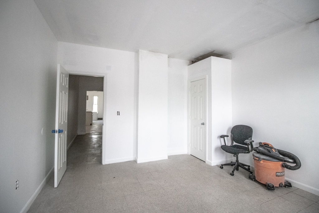 91 Elm Street Holyoke, MA 01040 - Photo 28 of 32 a workspace with a couch