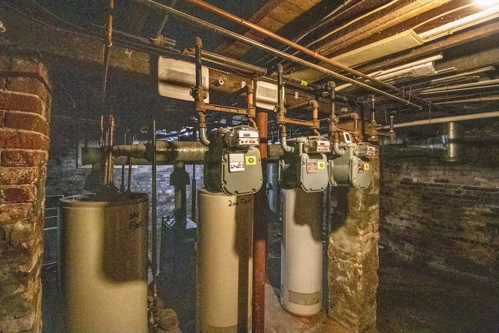 91 Elm Street Holyoke, MA 01040 - Photo 31 of 32 a water heater on the wall