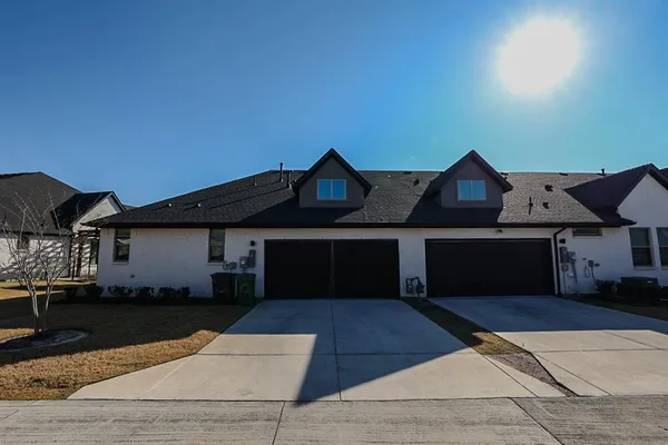 front view of a house with yard
