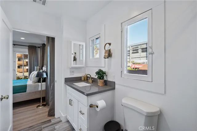 a spacious bathroom with a sink toilet and shower