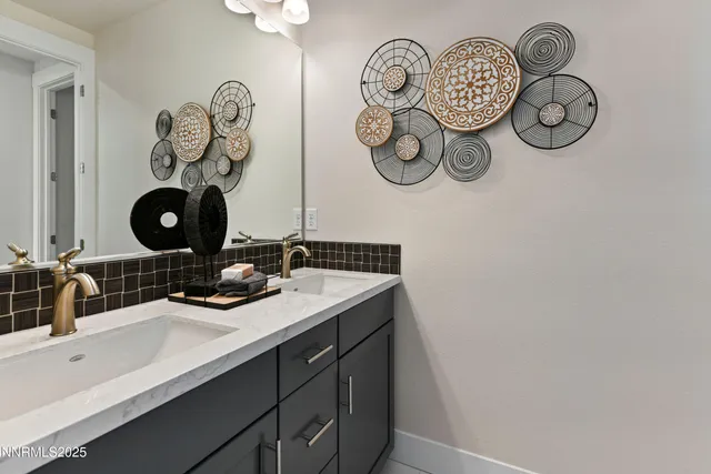 a bathroom with a sink toilet a mirror and bathtub