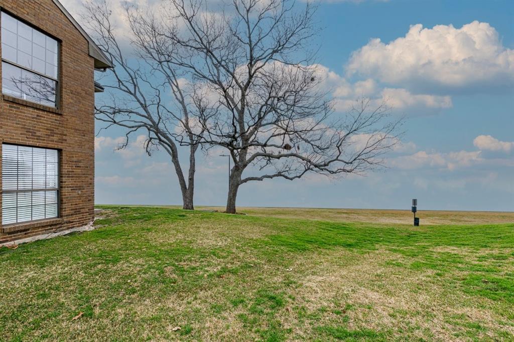 4606 Chaha Road, Unit 106 Garland, TX 75043 - Photo 6 of 22 View of yard