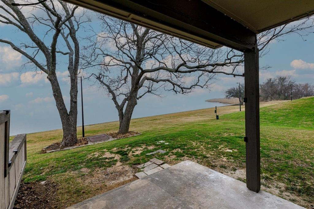 4606 Chaha Road, Unit 106 Garland, TX 75043 - Photo 7 of 22 View of yard with a patio area
