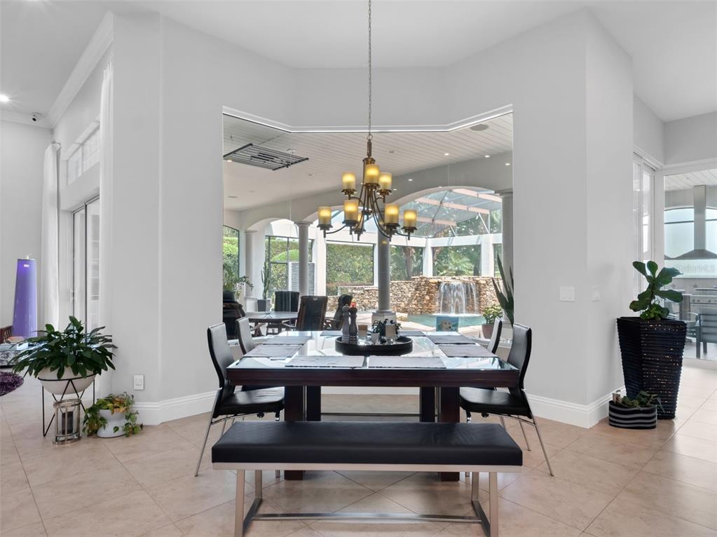 919 Banana Lake Road Lake Mary, FL 32746 - Photo 23 of 76 a view of a dining room with furniture window and outside view