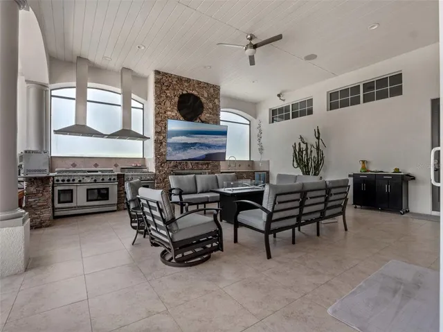 a view of a tables and chairs in a room