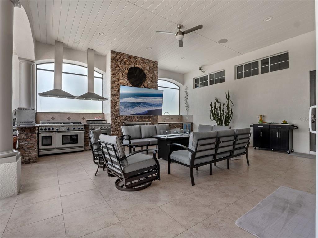 919 Banana Lake Road Lake Mary, FL 32746 - Photo 42 of 76 a living room with furniture and a flat screen tv