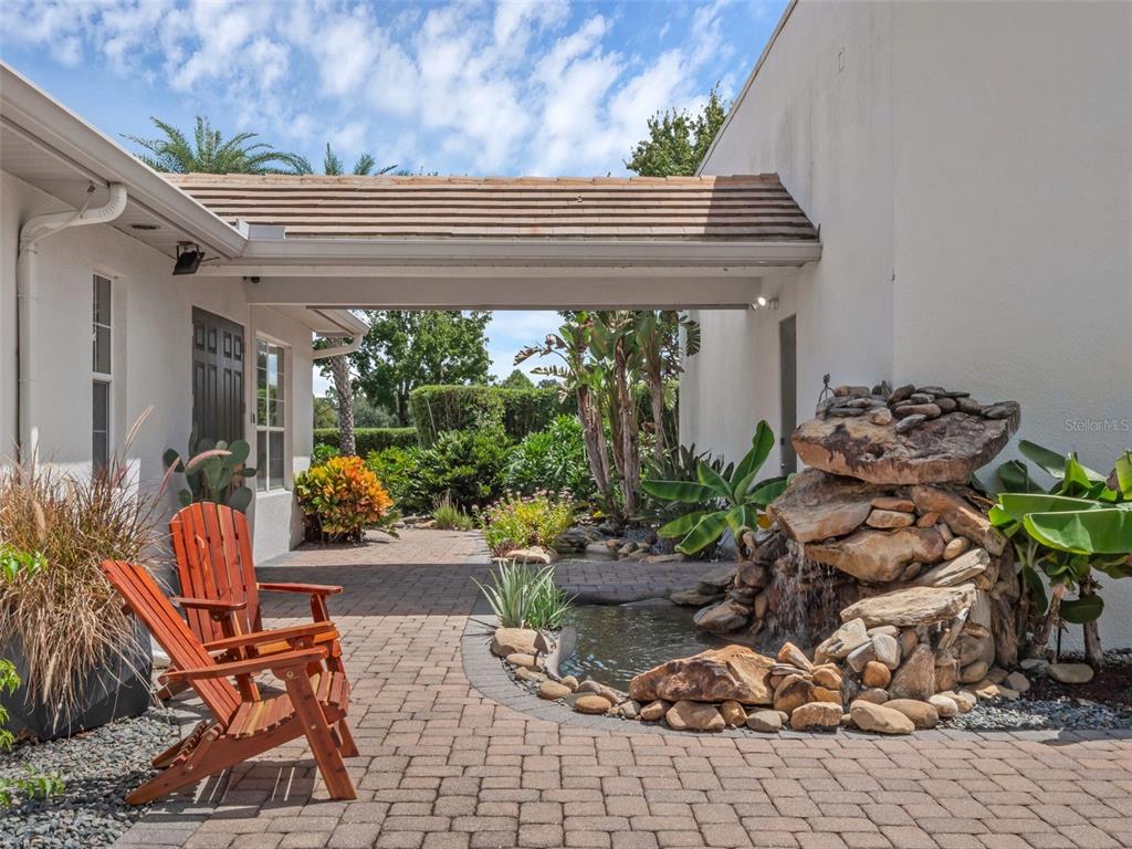 919 Banana Lake Road Lake Mary, FL 32746 - Photo 53 of 76 a outdoor living space with furniture and a potted plant