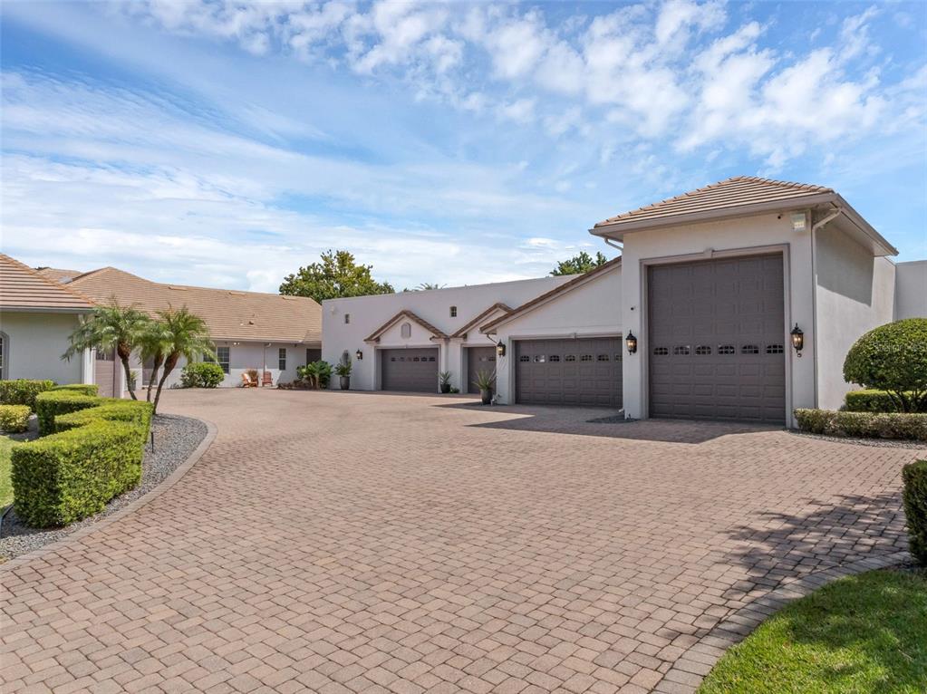 919 Banana Lake Road Lake Mary, FL 32746 - Photo 55 of 76 a front view of a house with a yard and garage