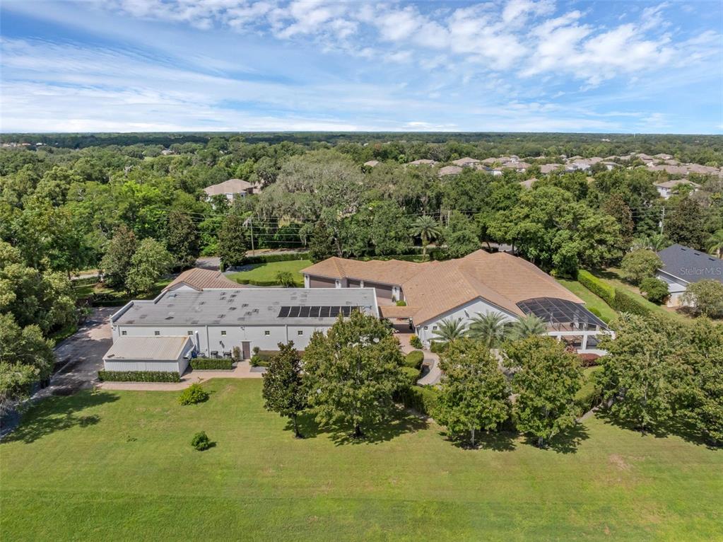 919 Banana Lake Road Lake Mary, FL 32746 - Photo 69 of 76 an aerial view of a house with a yard