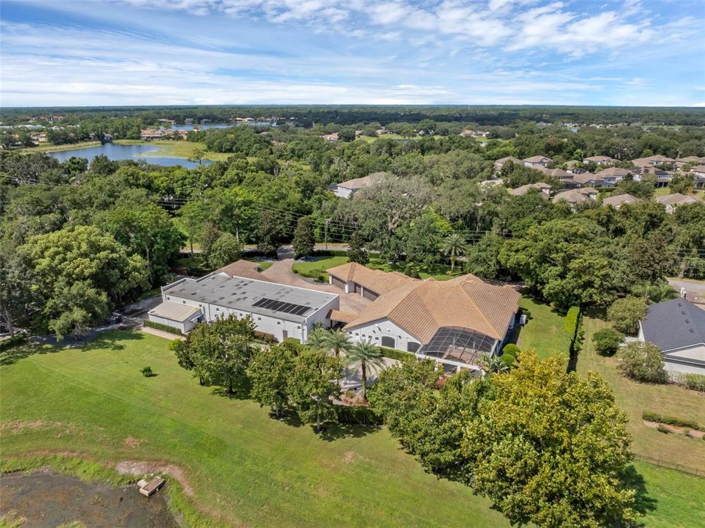 919 Banana Lake Road Lake Mary, FL 32746 - Photo 70 of 76 an aerial view of a house with a yard