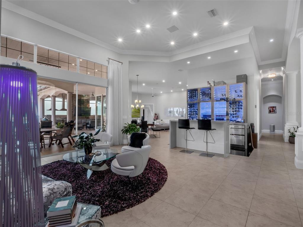 919 Banana Lake Road Lake Mary, FL 32746 - Photo 10 of 76 a living room with furniture appliances and a view