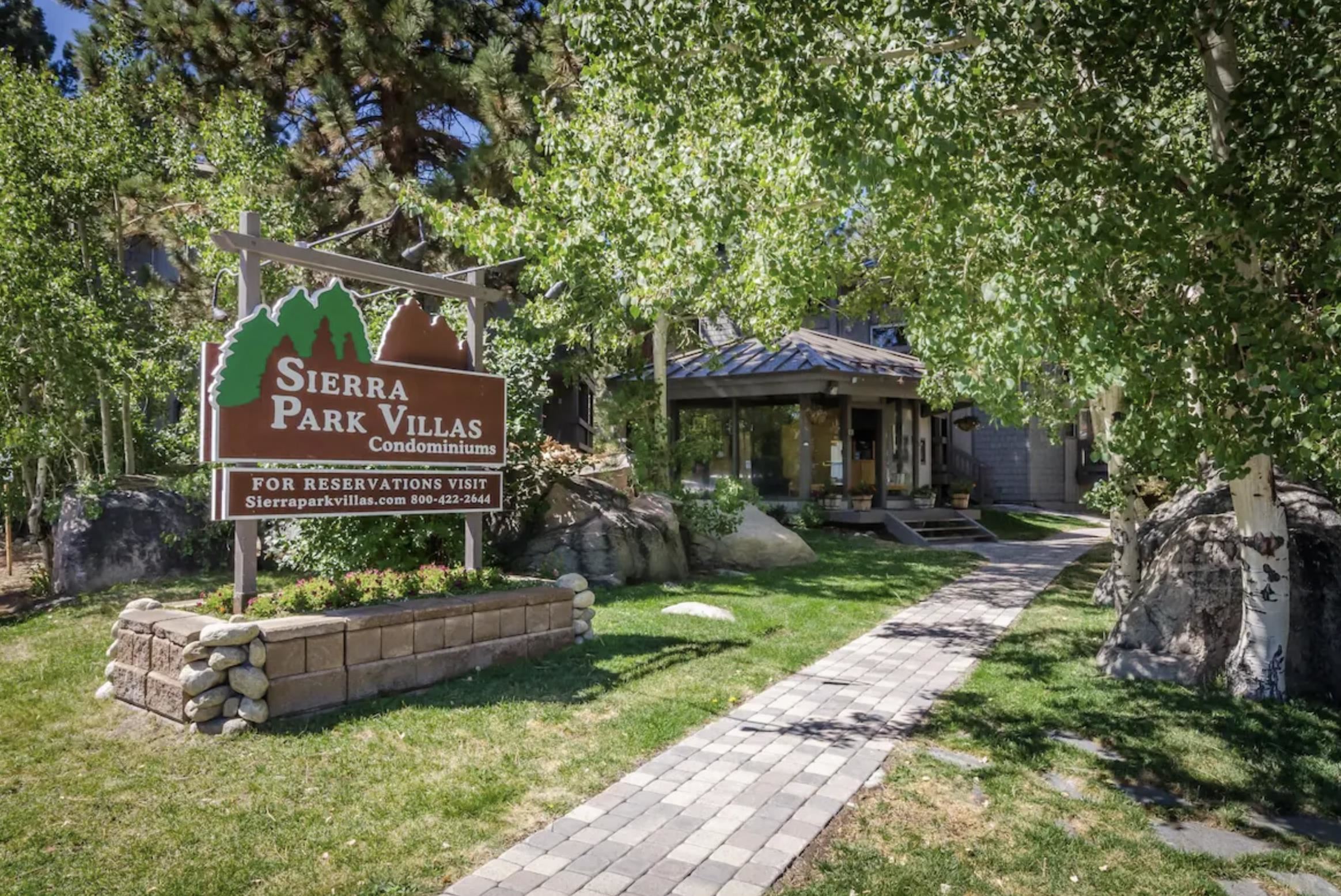 286 Old Mammoth Road, Unit 80 Mammoth Lakes, CA 93546 - Photo 14 of 19 a front view of a house with garden