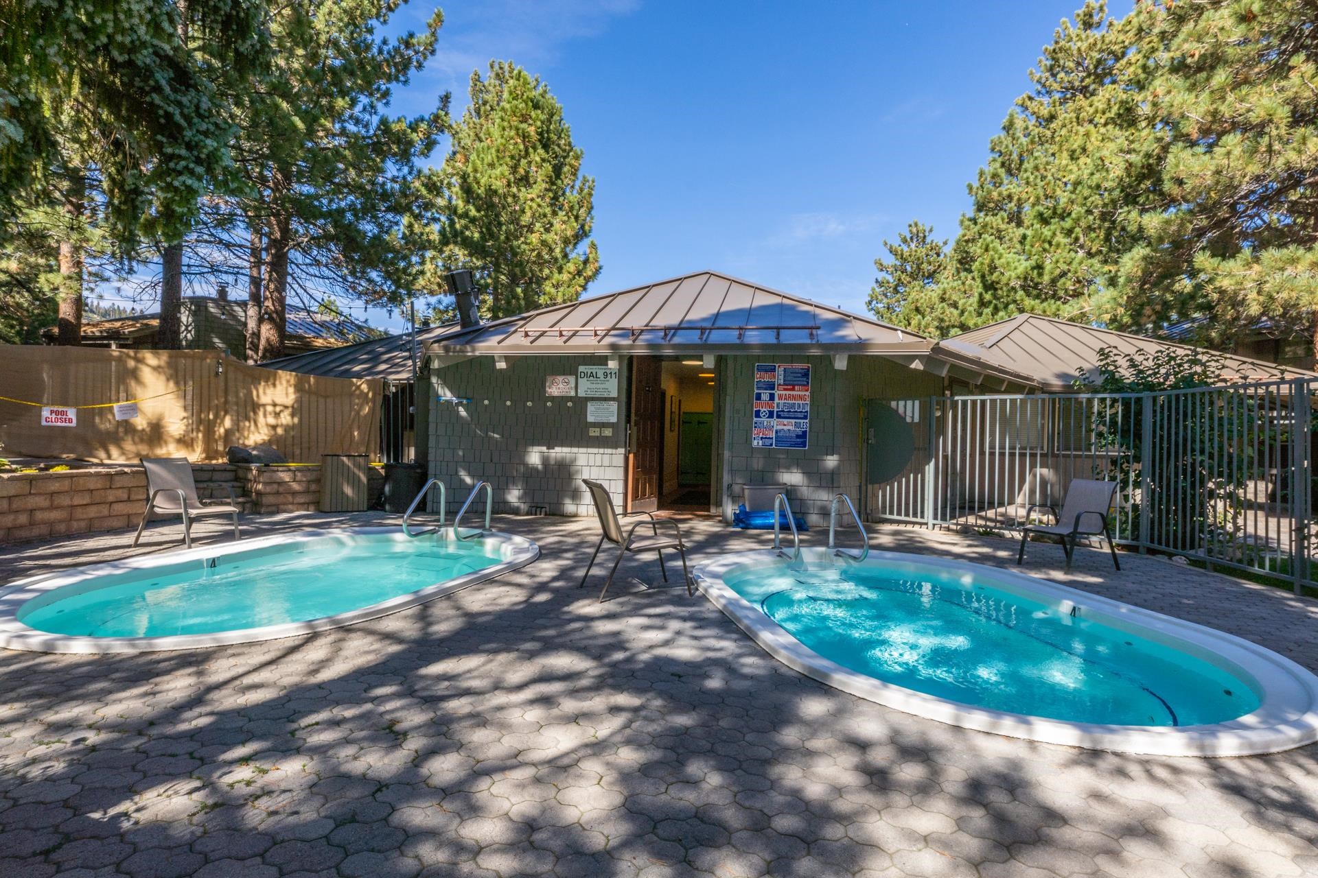 286 Old Mammoth Road, Unit 80 Mammoth Lakes, CA 93546 - Photo 16 of 19 a front view of a house with garden