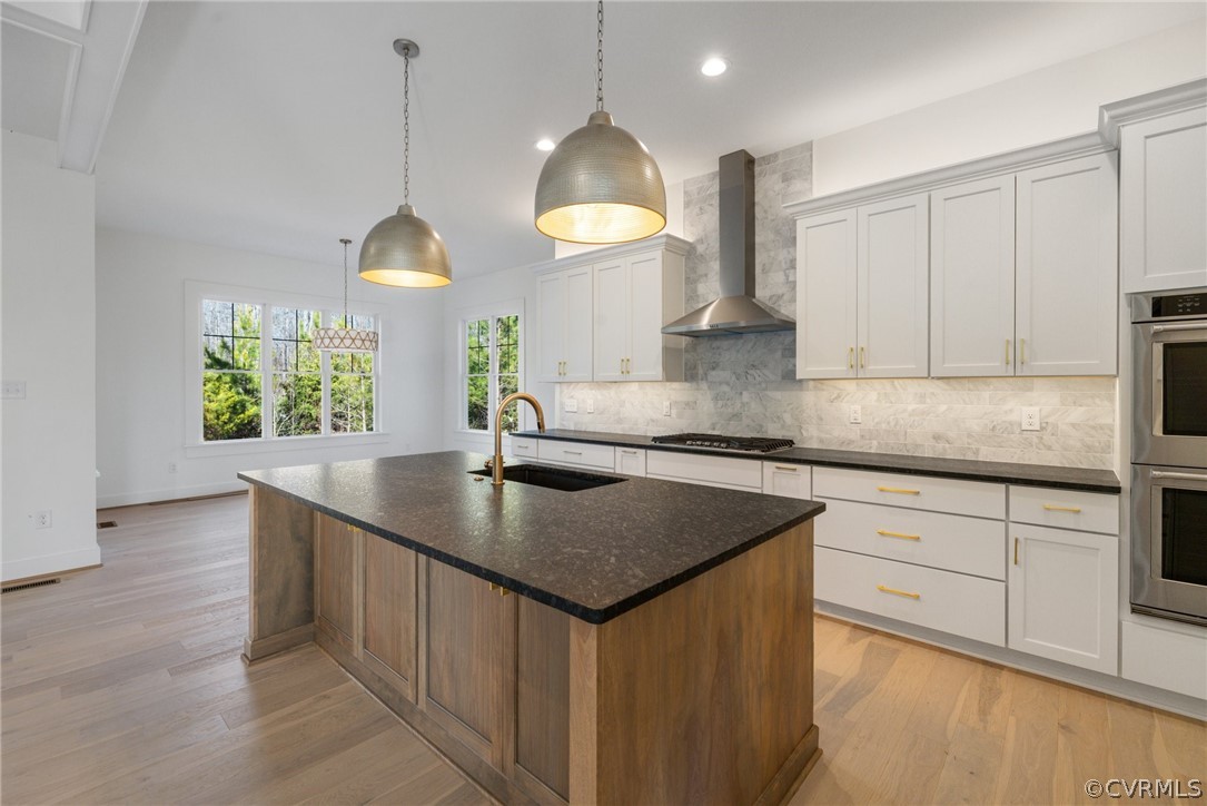 1558 Smokey Ridge Road Maidens, VA 23102 - Photo 14 of 43 a kitchen with kitchen island granite countertop a sink a counter space appliances and cabinets