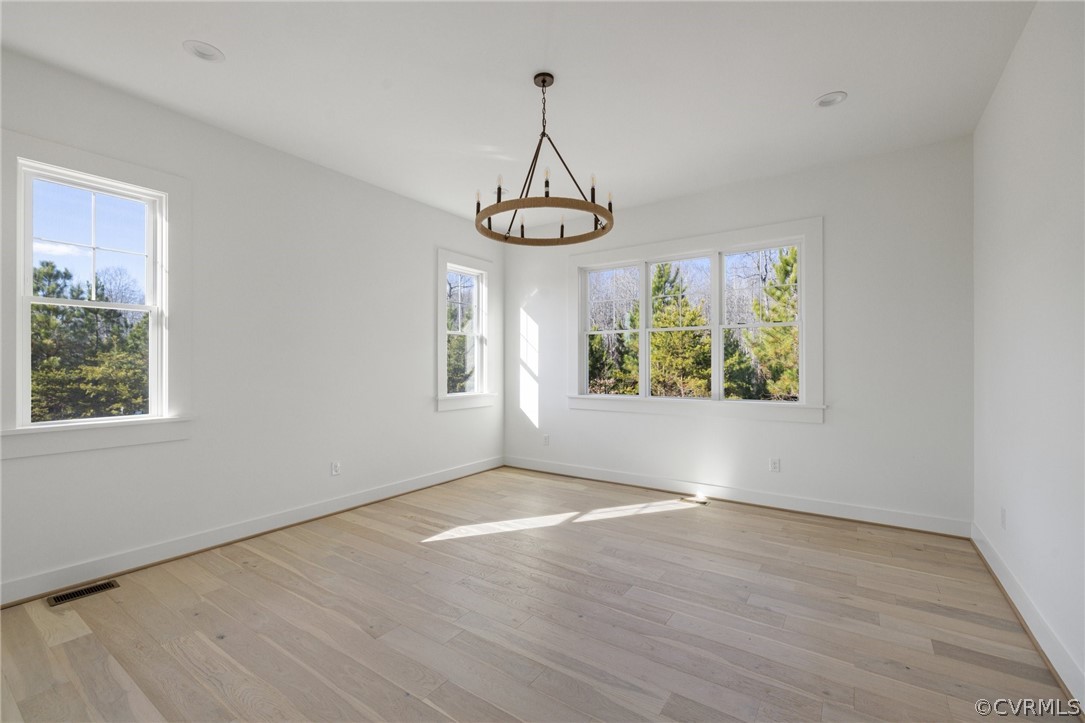 1558 Smokey Ridge Road Maidens, VA 23102 - Photo 20 of 43 wooden floor in an empty room with a window