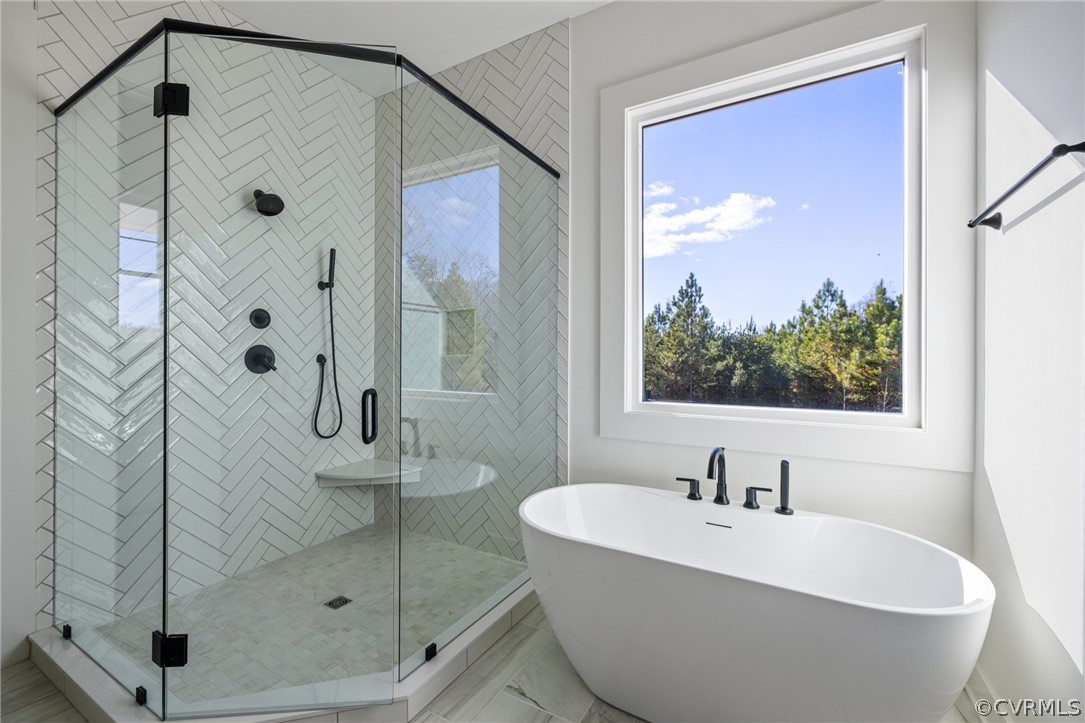 1558 Smokey Ridge Road Maidens, VA 23102 - Photo 23 of 43 a bathroom with a bathtub and shower
