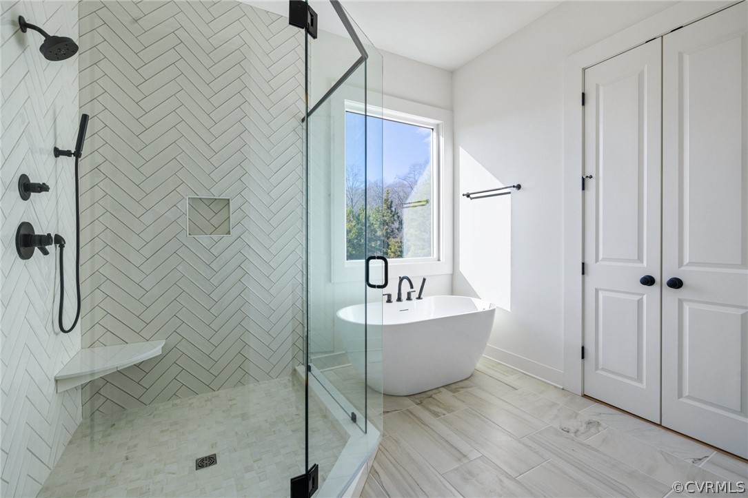 1558 Smokey Ridge Road Maidens, VA 23102 - Photo 24 of 43 a bathroom with a bathtub and shower