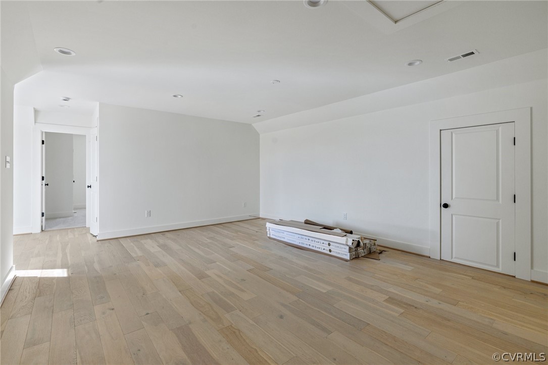 1558 Smokey Ridge Road Maidens, VA 23102 - Photo 27 of 43 a view of a room with wooden floor and white walls