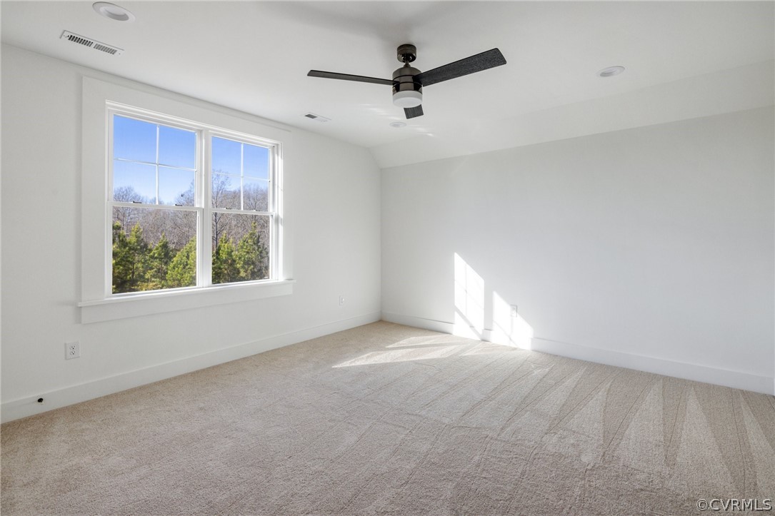 1558 Smokey Ridge Road Maidens, VA 23102 - Photo 30 of 43 a view of a livingroom with a ceiling fan and window