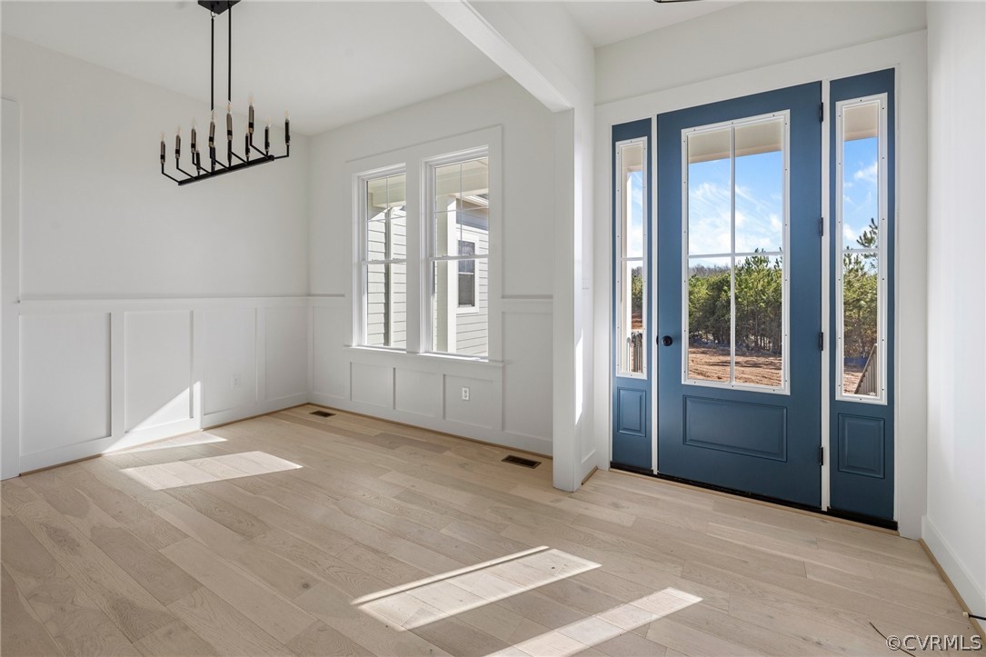 1558 Smokey Ridge Road Maidens, VA 23102 - Photo 4 of 43 an empty room with windows and closet