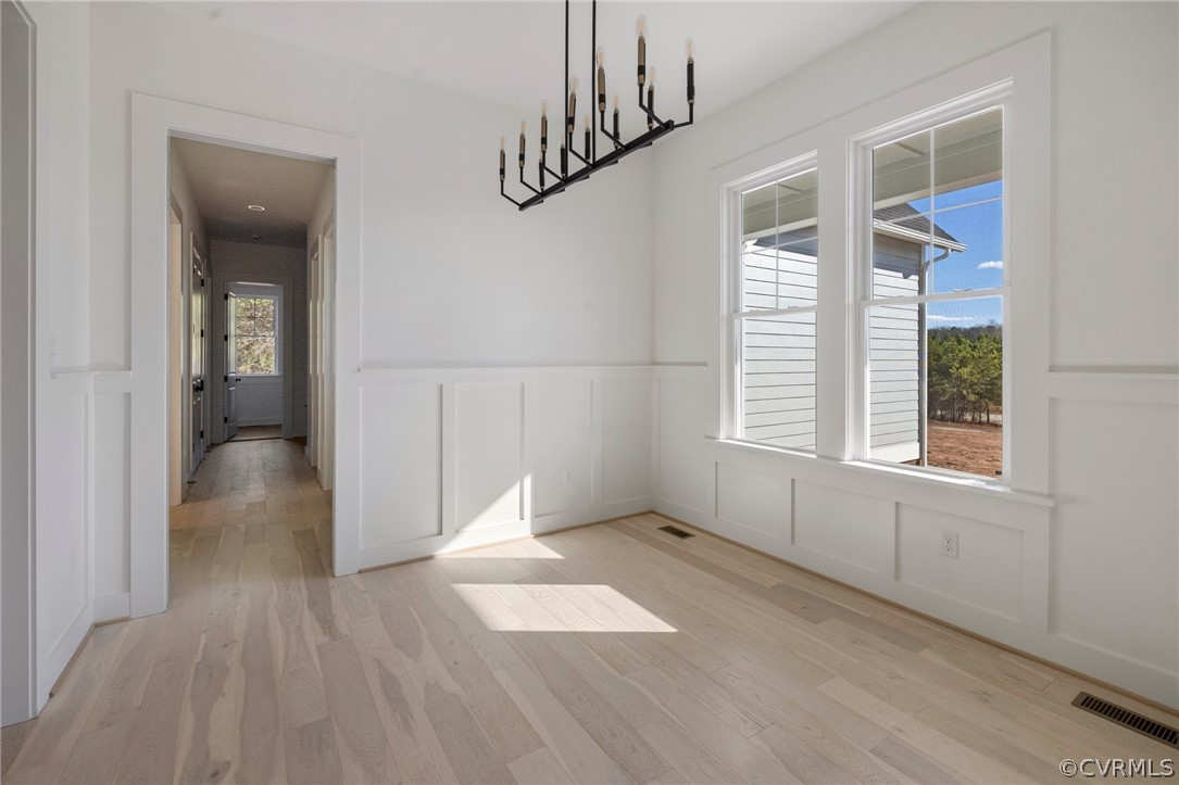 1558 Smokey Ridge Road Maidens, VA 23102 - Photo 5 of 43 wooden floor in an empty room with a window