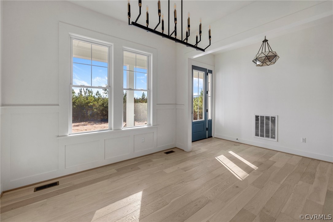 1558 Smokey Ridge Road Maidens, VA 23102 - Photo 6 of 43 a view of an empty room with a window