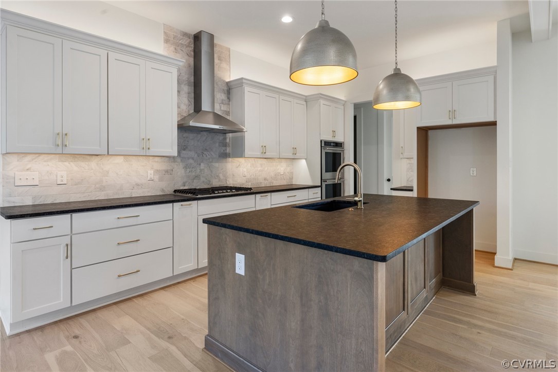 1558 Smokey Ridge Road Maidens, VA 23102 - Photo 9 of 43 a kitchen with kitchen island granite countertop a sink a counter space and cabinets