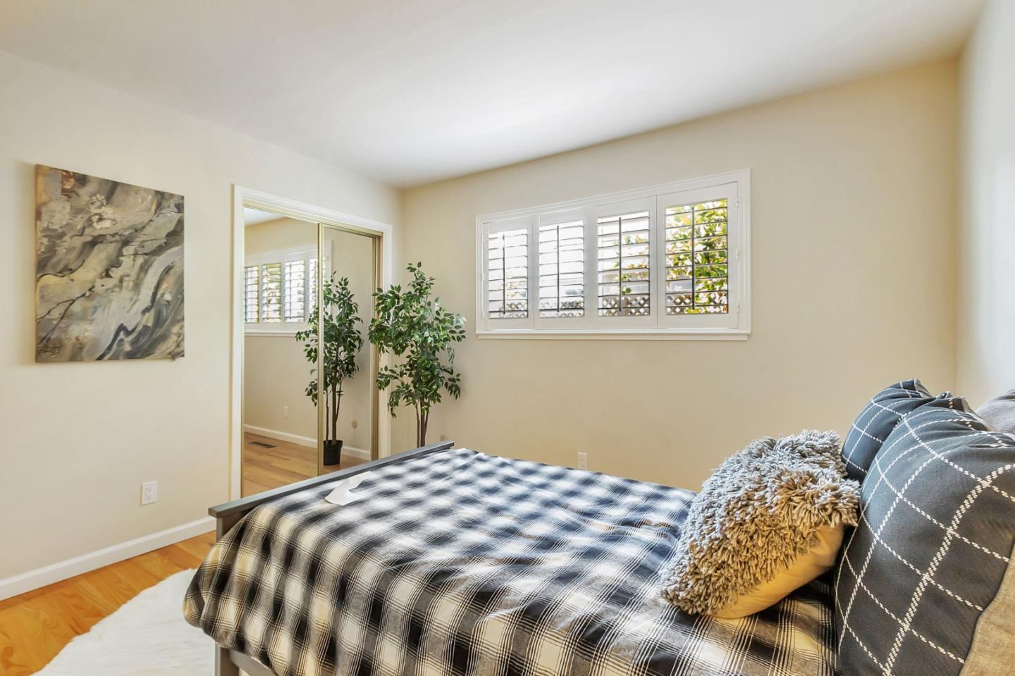 1051 Suffolk Way Los Altos, CA 94024 - Photo 27 of 47 a bedroom with a bed and a window