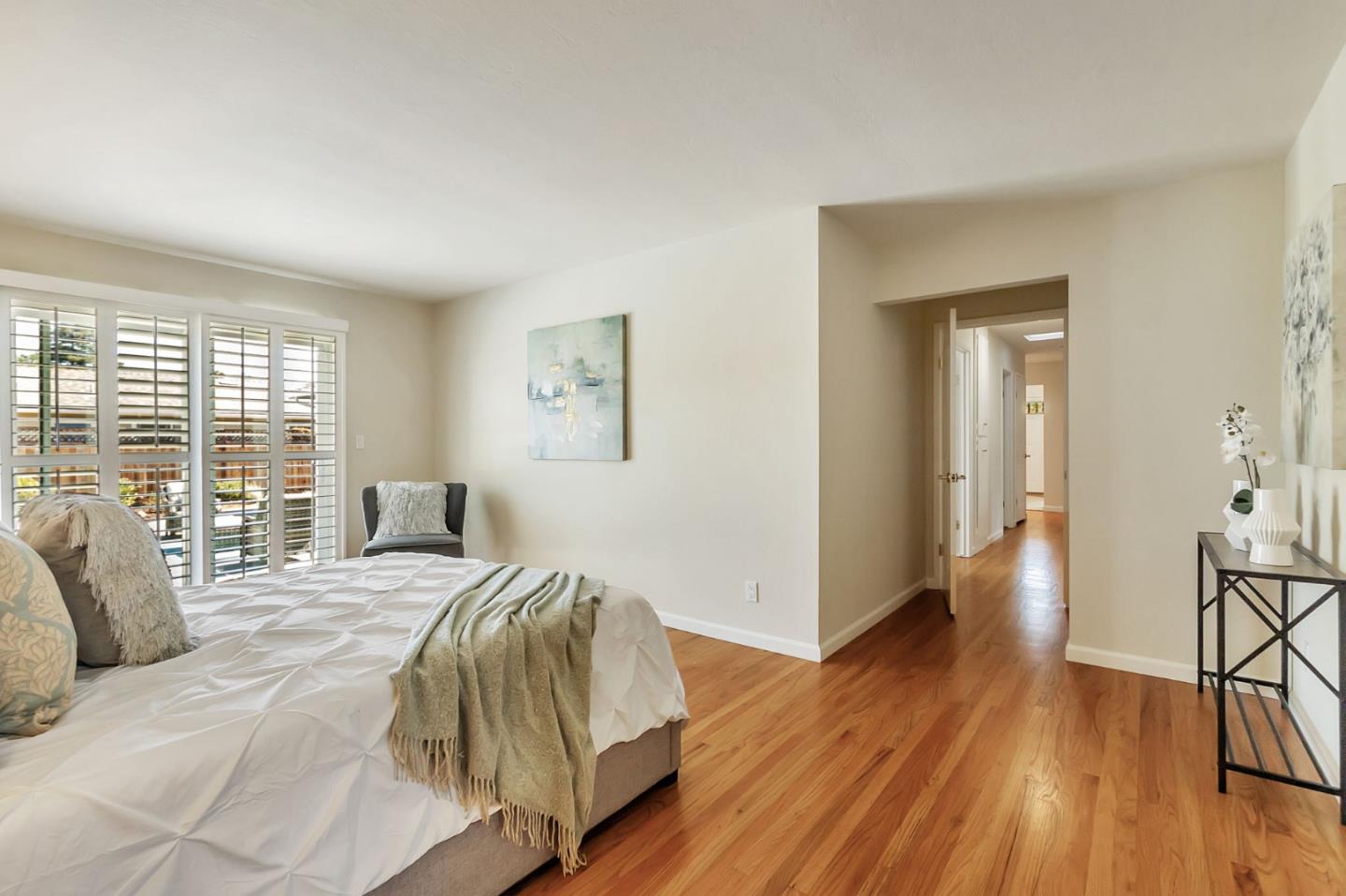 1051 Suffolk Way Los Altos, CA 94024 - Photo 30 of 47 a bedroom with a bed and wooden floor