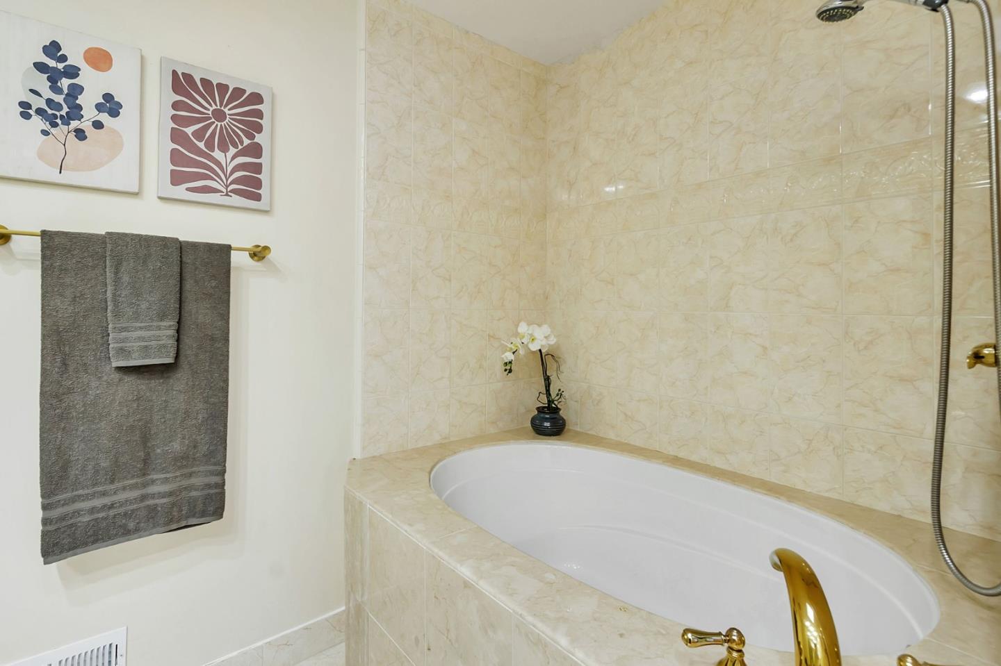 1051 Suffolk Way Los Altos, CA 94024 - Photo 37 of 47 a bathroom with a bathtub