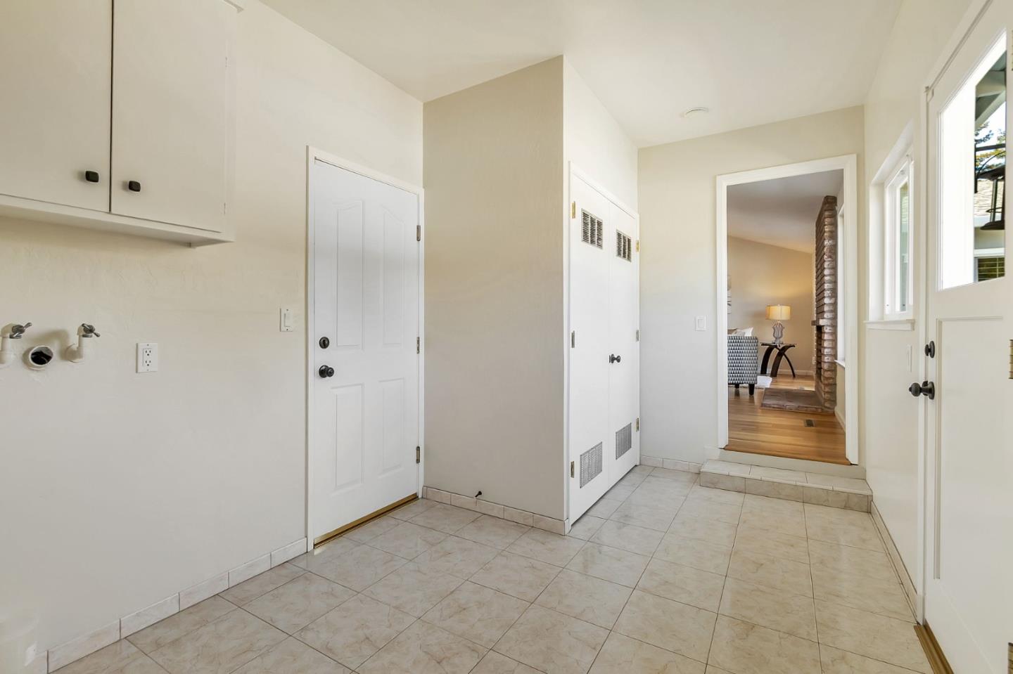 1051 Suffolk Way Los Altos, CA 94024 - Photo 40 of 47 a view of a hallway with closet and a fireplace