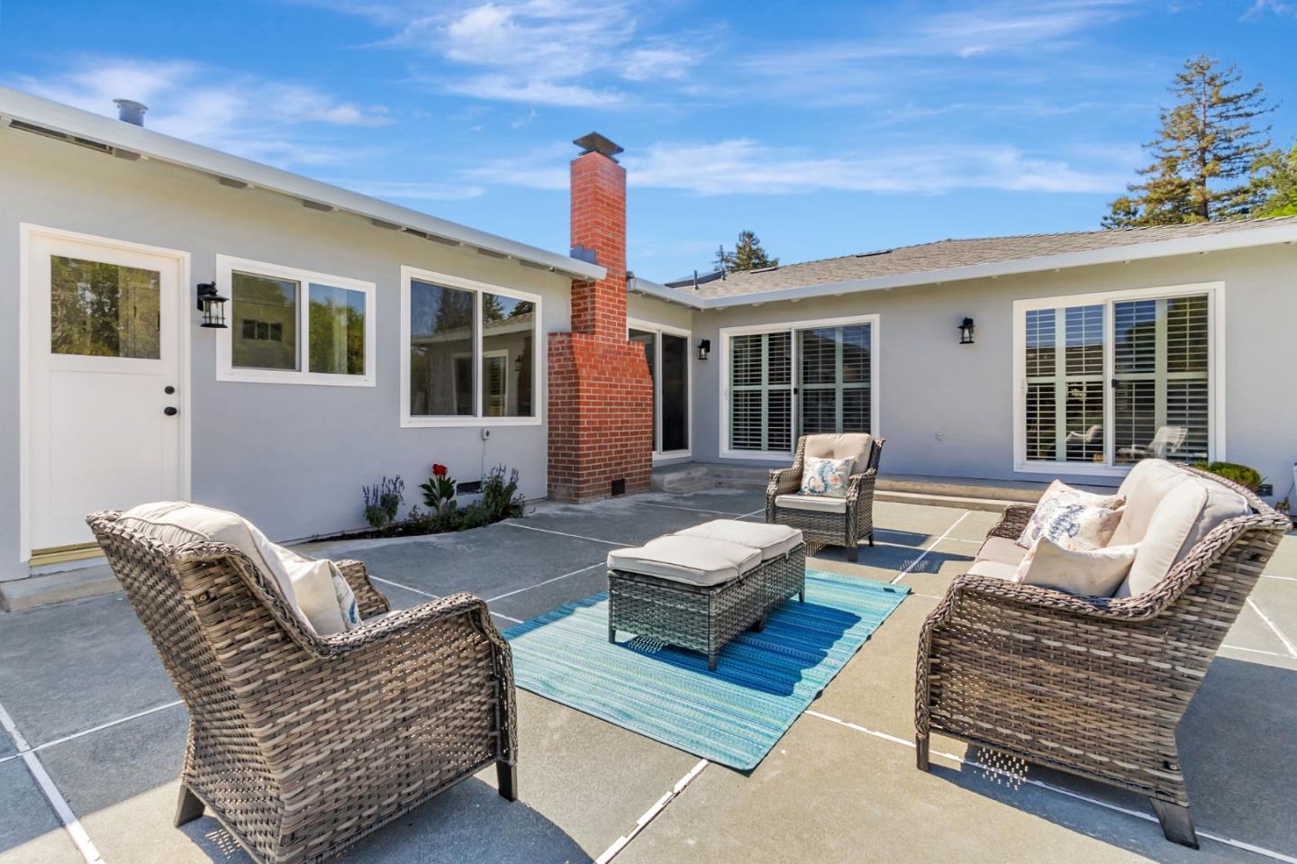 1051 Suffolk Way Los Altos, CA 94024 - Photo 43 of 47 a view of a patio with couches chairs and potted plants