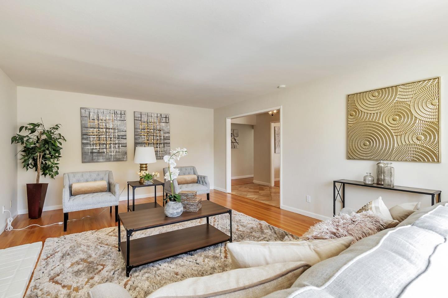 1051 Suffolk Way Los Altos, CA 94024 - Photo 9 of 47 a living room with furniture and a potted plant