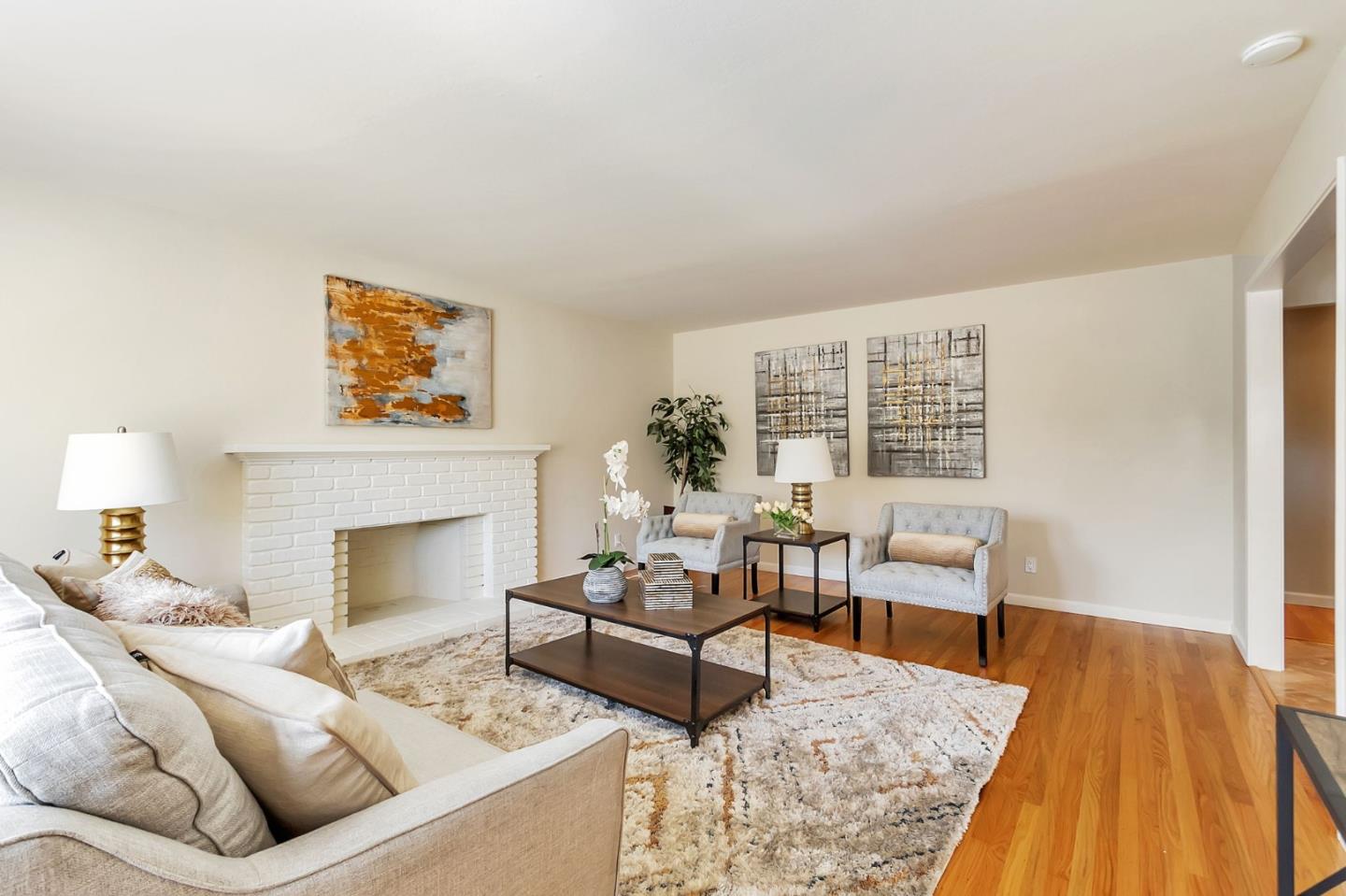 1051 Suffolk Way Los Altos, CA 94024 - Photo 10 of 47 a living room with furniture and a fireplace