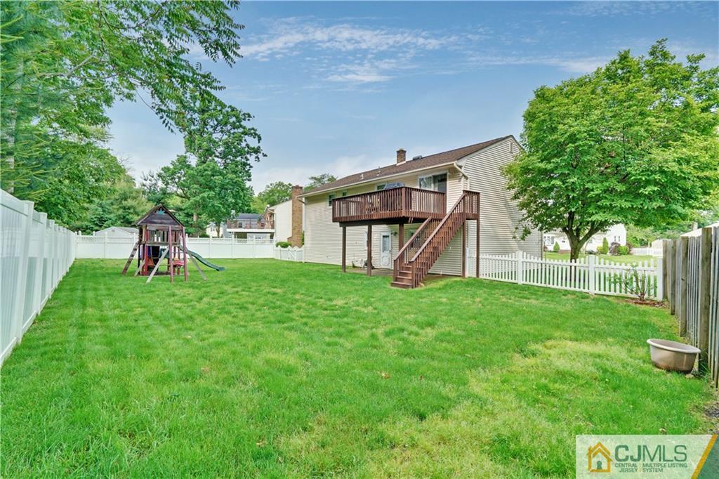 21 Louise Road Edison, NJ 08817 - Photo 28 of 29 a view of a backyard with a garden and entertaining space