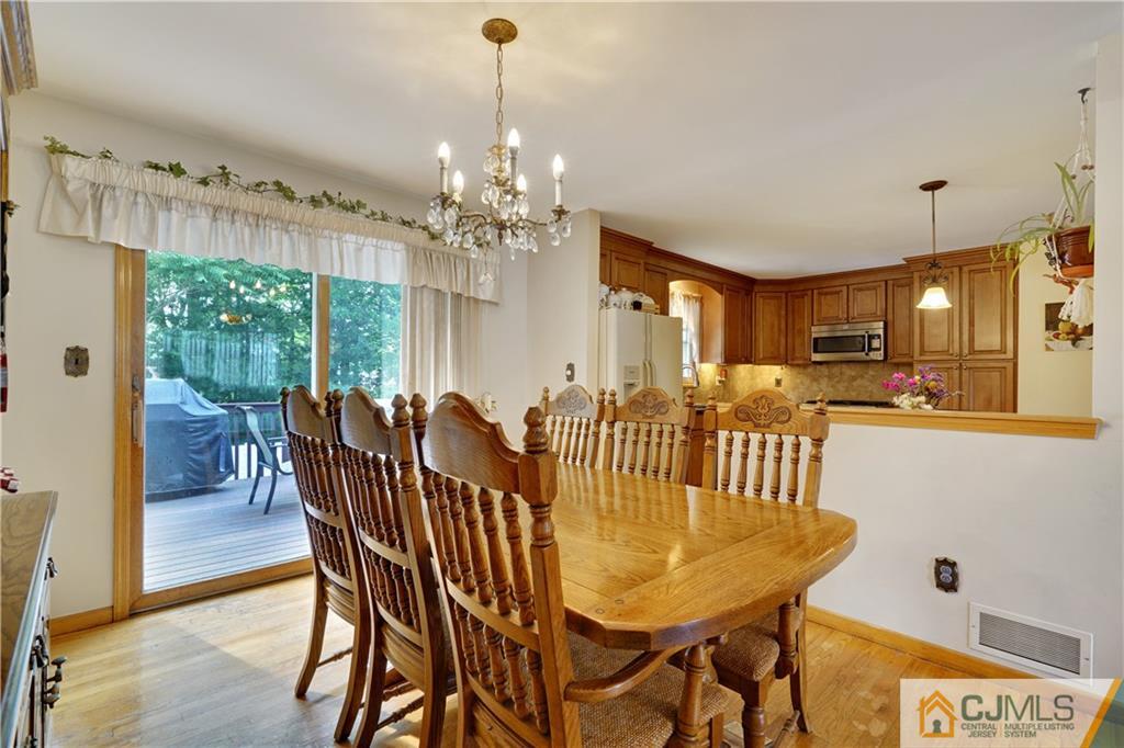 21 Louise Road Edison, NJ 08817 - Photo 6 of 29 a view of a dining room with furniture window and outside view