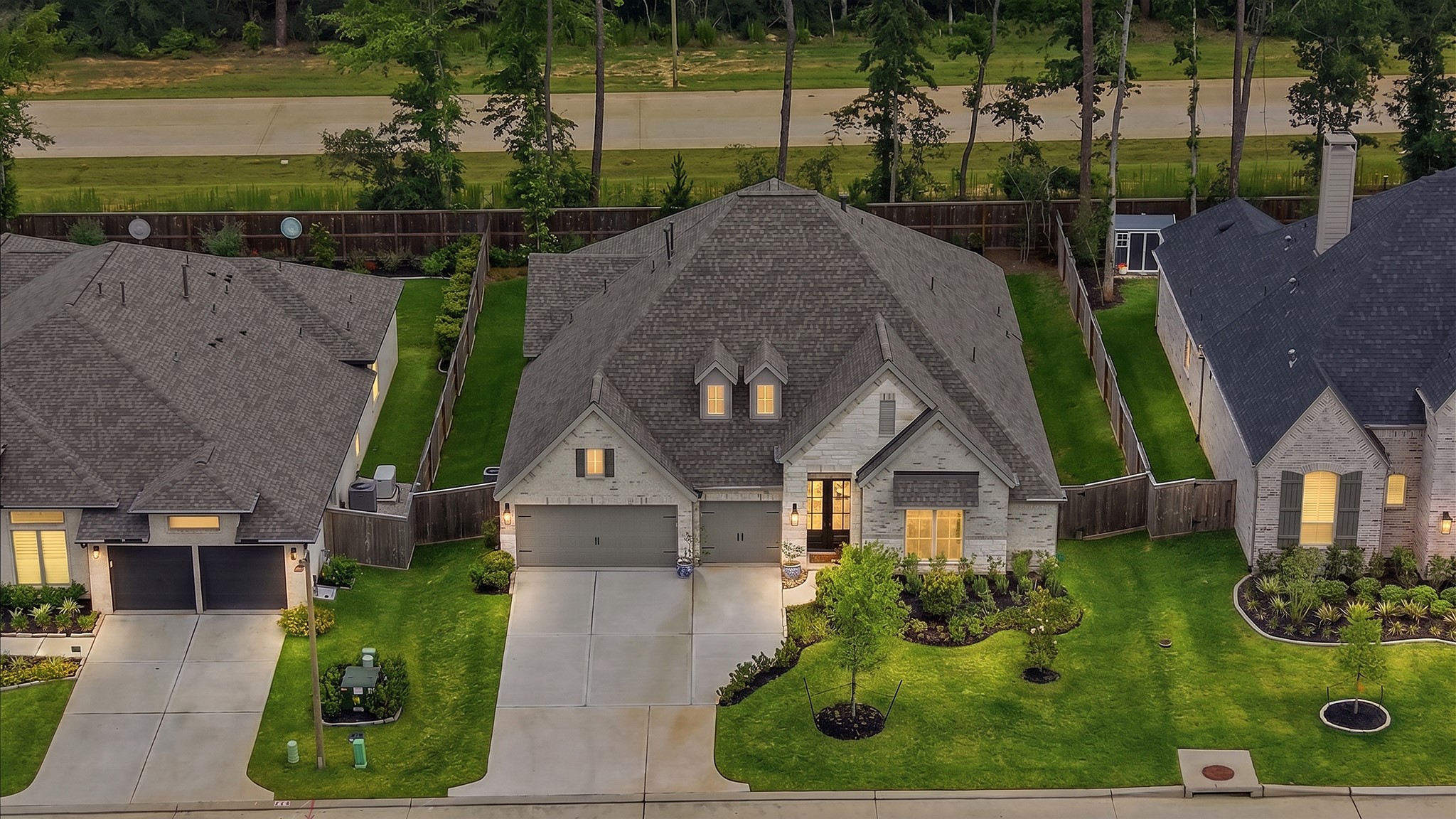218 Wooded Rill Court Conroe, TX 77318 - Photo 49 of 50 Aerial Twiight View