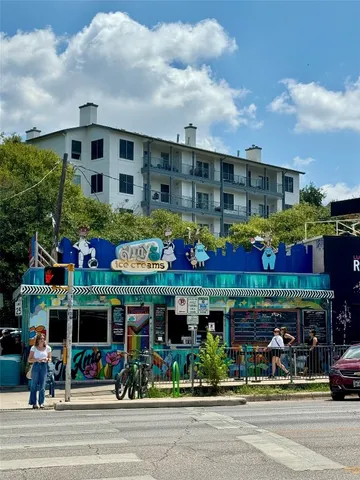 a view of street with shops