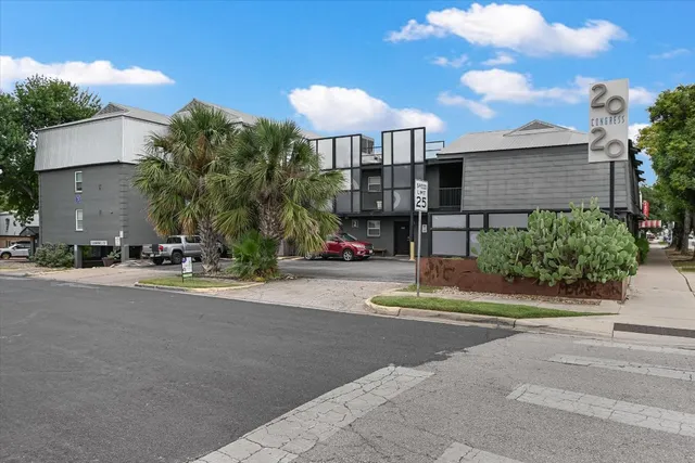 a view of a street with houses