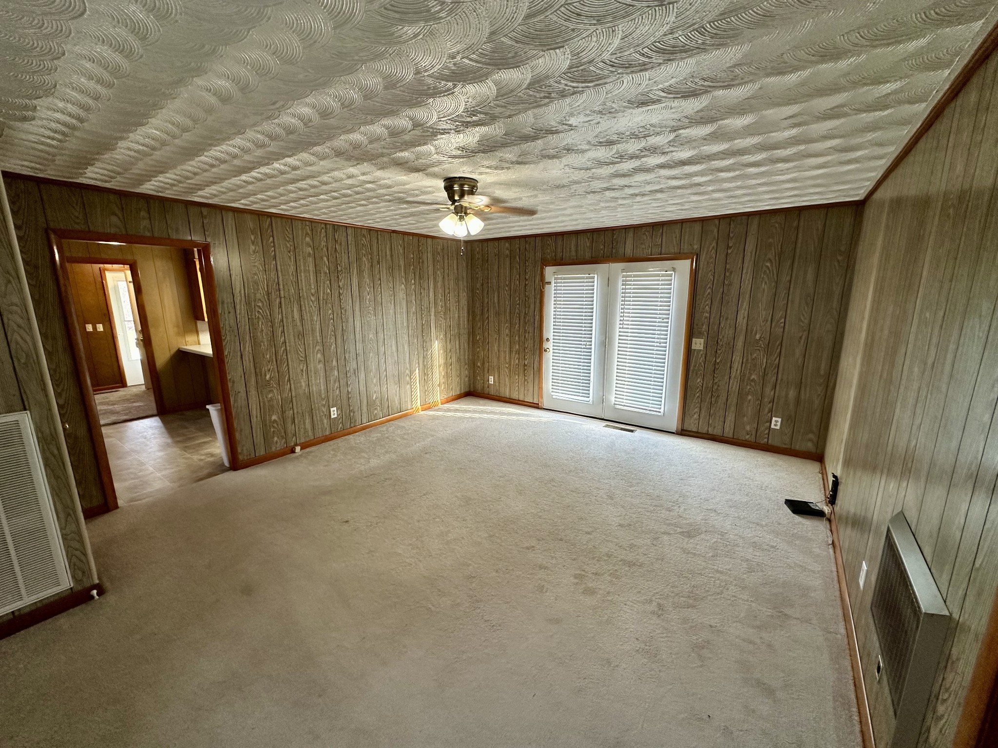 329 Poplar Drive Red Boiling Springs, TN 37150 - Photo 6 of 15 a view of an empty room with a fireplace