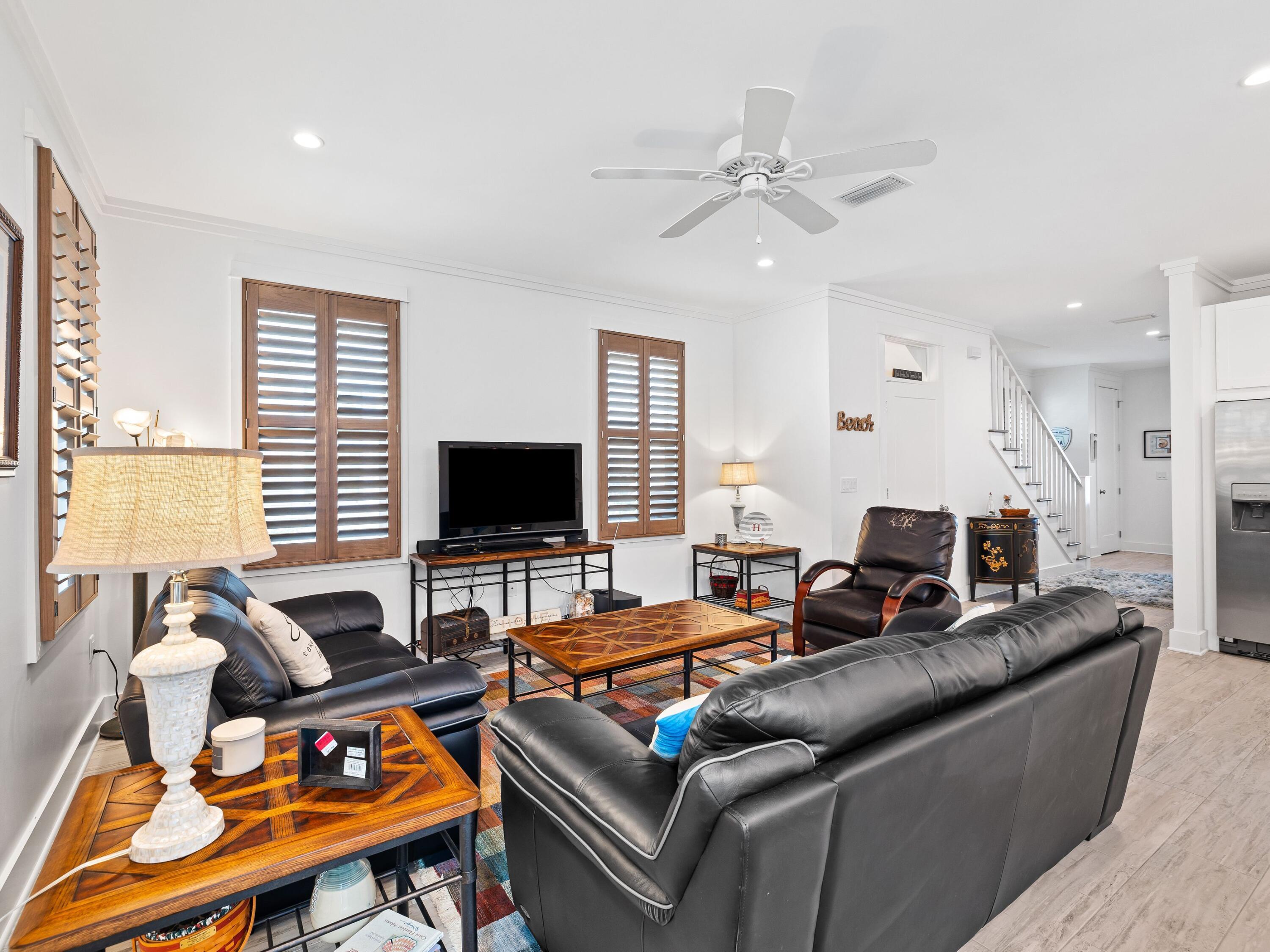 24 Lighthouse Pointe Boulevard Santa Rosa Beach, FL 32459 - Photo 8 of 21 a living room with furniture and a flat screen tv