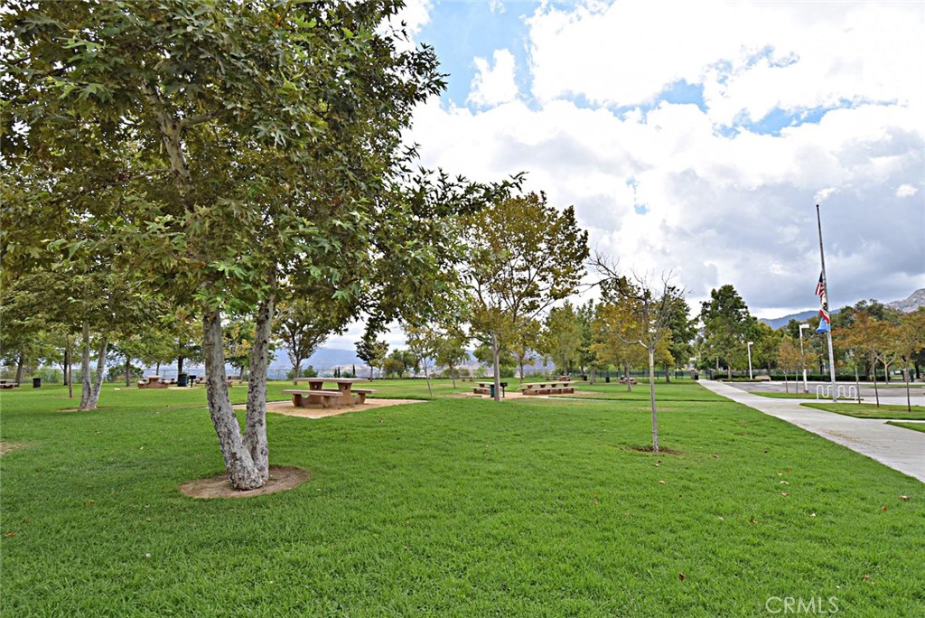 25533 Longfellow Place Stevenson Ranch, CA 91381 - Photo 45 of 47 a garden with trees in the background