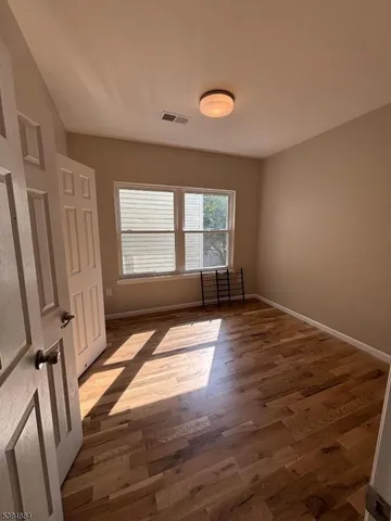 a view of empty room with front door