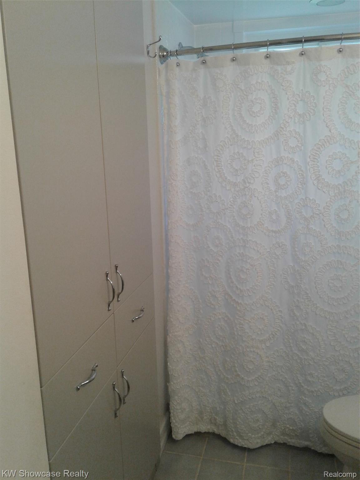 1916 Henbert Road West Bloomfield, MI 48324 - Photo 16 of 19 Large linen closet in bathroom