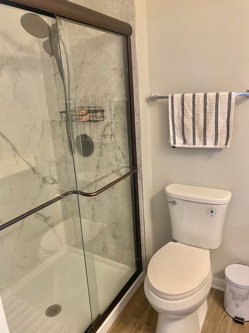 90 Decker Drive Cary, IL 60013 - Photo 4 of 12 a white toilet sitting next to a bath tub