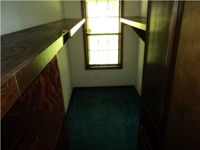 1584 Spring Hill Road Raymond, MS 39154 - Photo 14 of 15 Master bedroom walk-in-closet