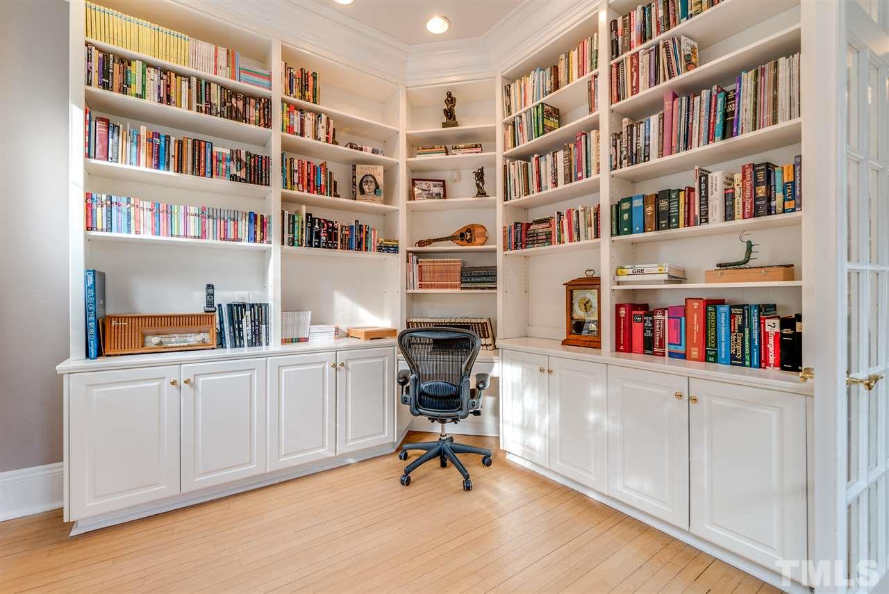 405 Dekoven Place Raleigh, NC 27608 - Photo 11 of 25 Large study with built-in bookcases. This home is wired with CAT5 in conduit, making it easy to run new wires if needed!