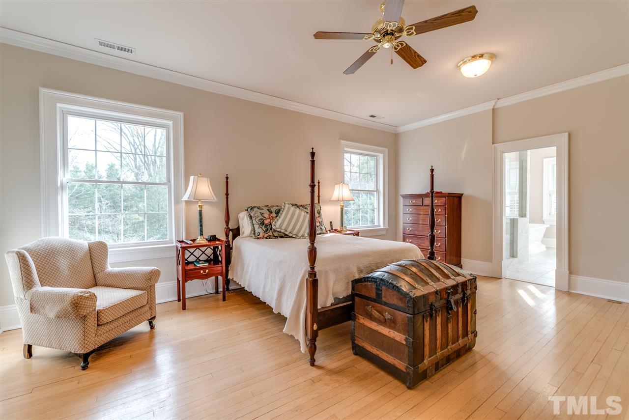 405 Dekoven Place Raleigh, NC 27608 - Photo 16 of 25 Master bedroom overlooks beautifully landscaped backyard.