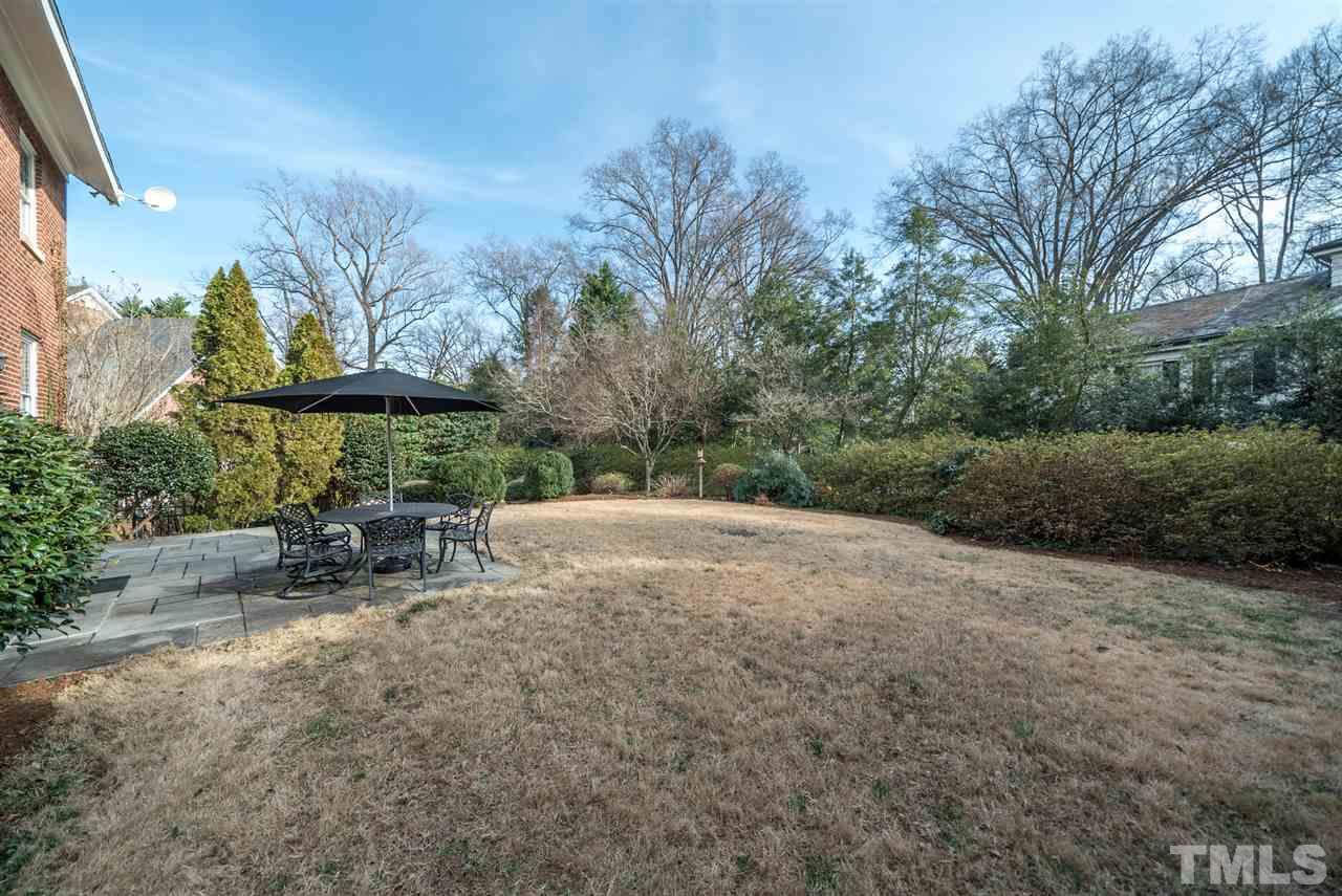 405 Dekoven Place Raleigh, NC 27608 - Photo 25 of 25 Full fenced, private, flat back yard is perfect for enjoying the weather.