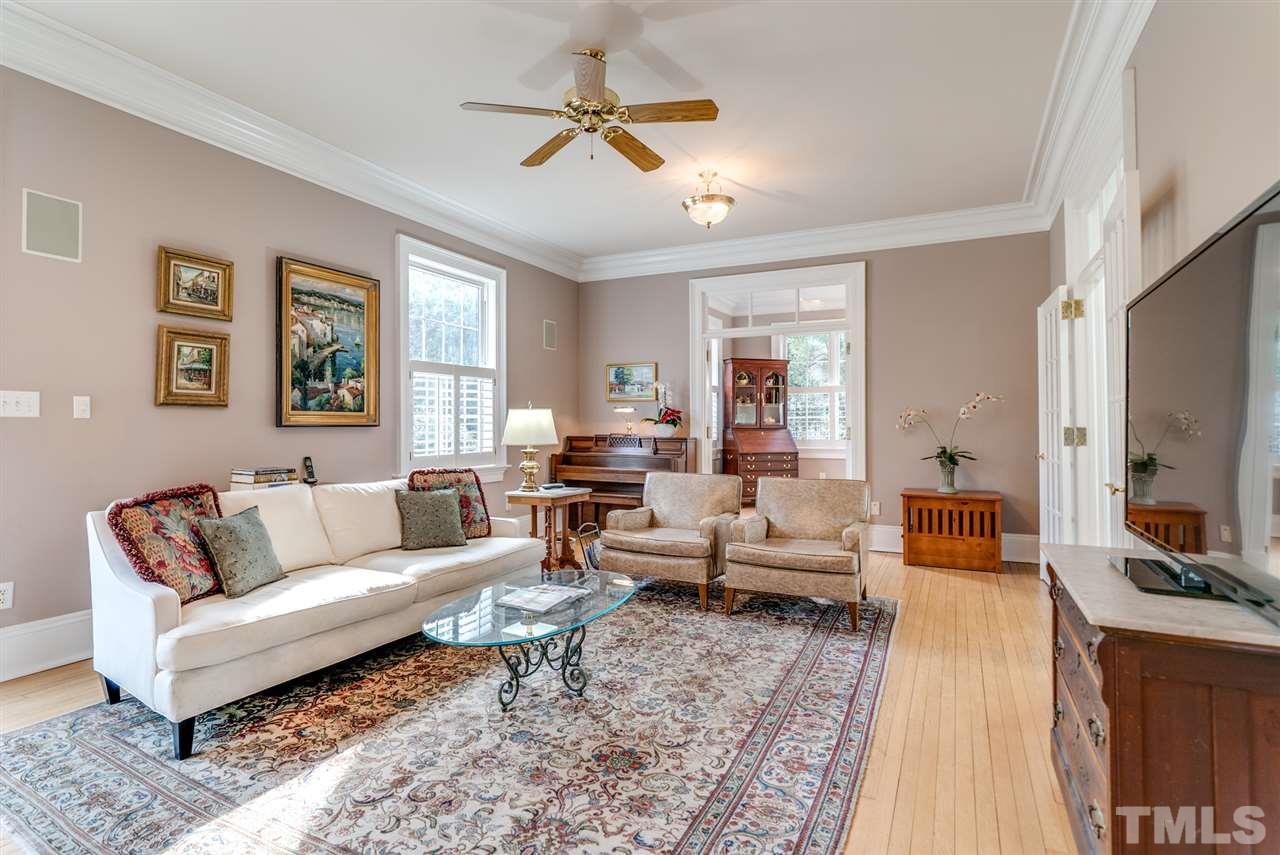 405 Dekoven Place Raleigh, NC 27608 - Photo 4 of 25 Huge living room with original french doors